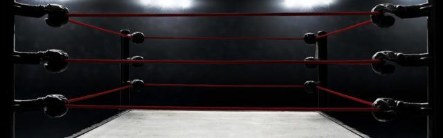 boxing arena surrounded by spotlights